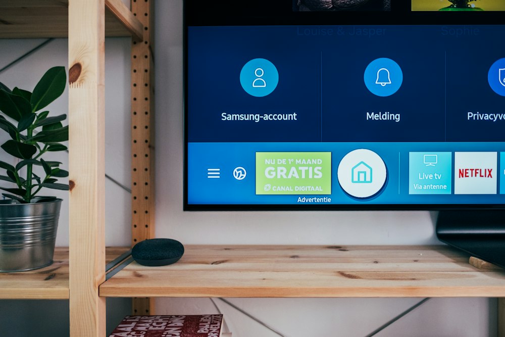 A Framed-Art TV Cover That Retracts or Flips to Reveal the Screen