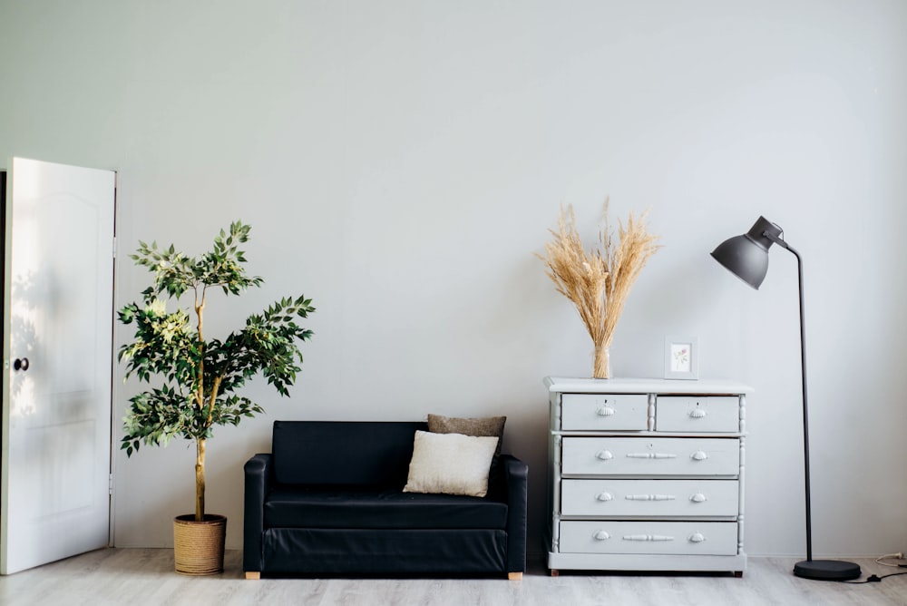 A Sliding Panel or Barn-Door-Style Cover Over a Wall-Mounted TV